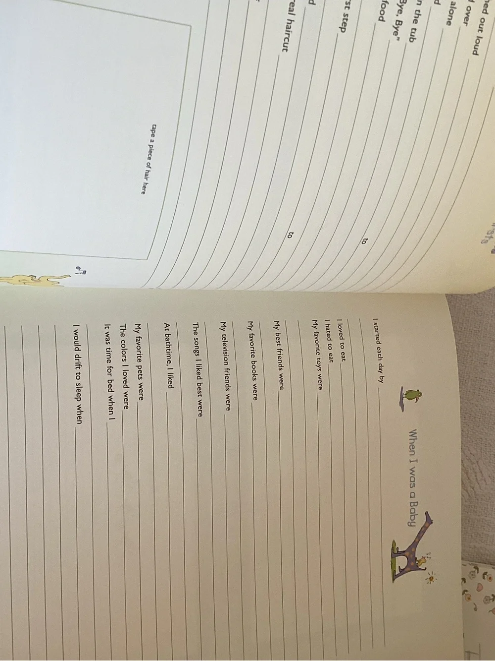 Baby’s first year calendar and milestone hardcover keepsake book